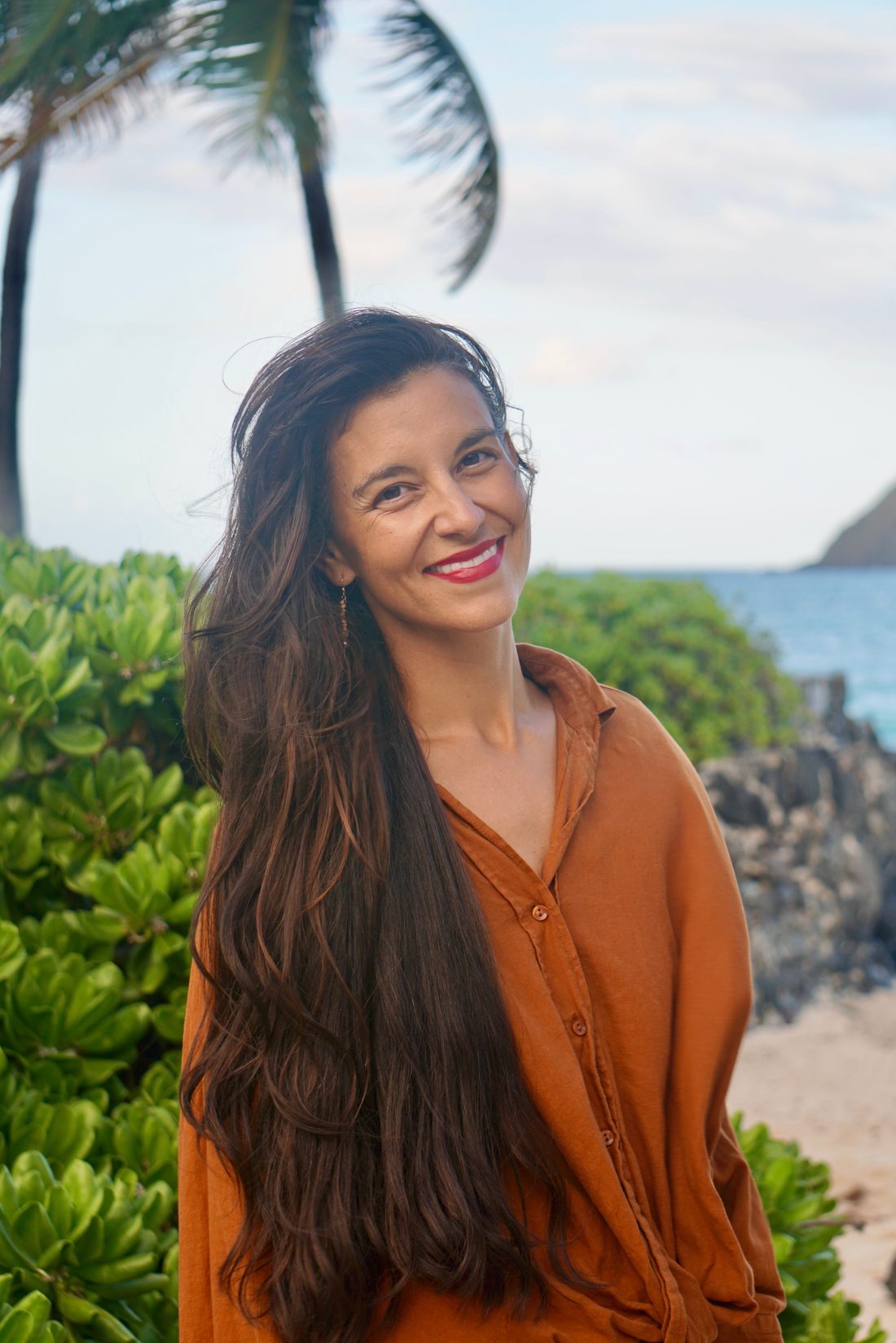 Katie Nickens on the beach at Waimānalo